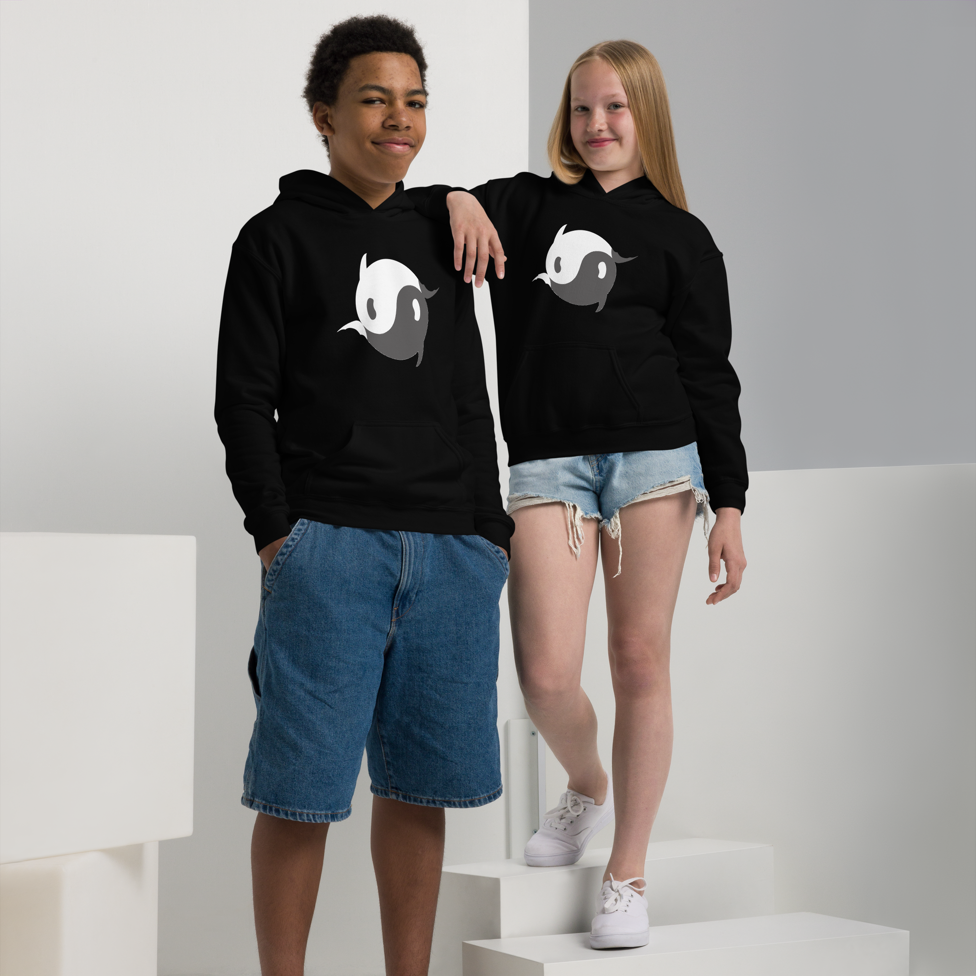 youth-heavy-blend-hoodie-black-front-68f3bd4427283.png